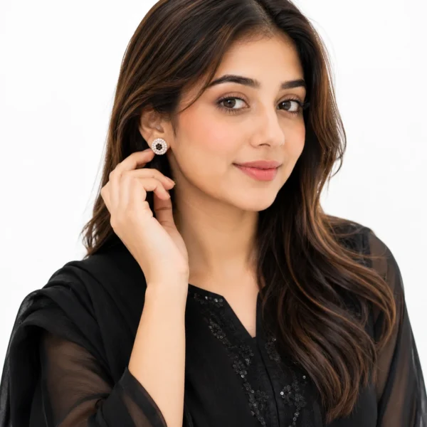 Silver stud earrings with a sparkling round stone design