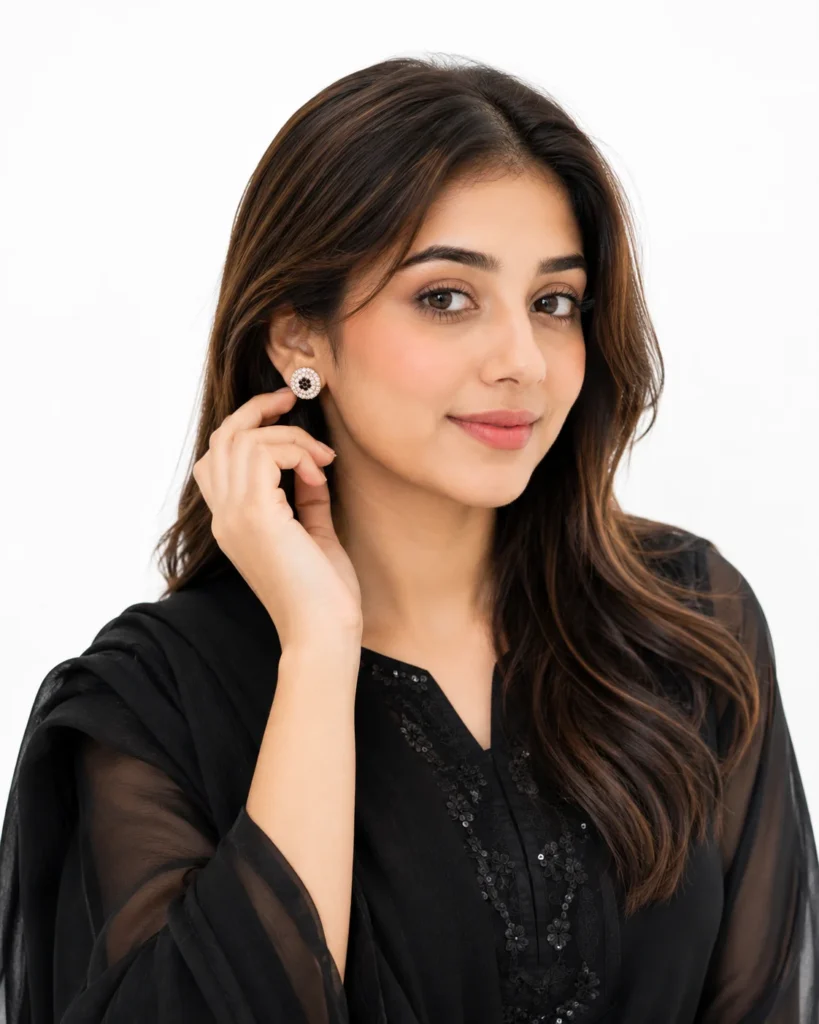 Silver stud earrings with a sparkling round stone design