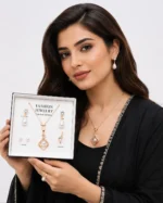 Artificial jewellery set with floral pearl pendant and matching earrings