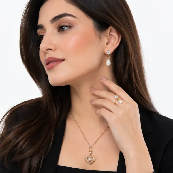 Simple jewellery set with elegant pearl pendant and matching earrings