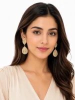 Woman wearing elegant teardrop earrings